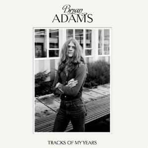Um jovem Bryan Adams posa na capa de