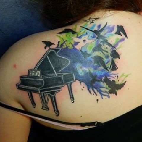Flying-Birds-With-Nice-Grand-Piano-Tattoo-On-Upper-Back